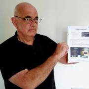 Robert Thomas, 61, was charged £90 for parking at Salisbury District Hospital, despite buying a ticket.