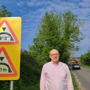 Councillor Nick Baker wants all high lorry drivers delivering to ASDA to be briefed on the bridge.
