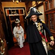 Lord Nelson, played by professional Nelson actor Alex Naylor, and his mistress Lady Hamilton, played by Finni Golden enter Salisbury Guildhall 2015.