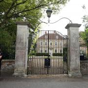 A police officer stands at the gate of Arundells, the former home of Sir Edward Heath in Salisbury, Wiltshire. Child sex allegations involving the late Prime Minister are at the centre of a police corruption investigation. Picture date: August 3, 2015