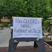 A sign was posted in the pub's garden.