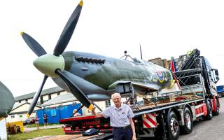 Norman Parker with a replica Spitfire which is now displayed at Salisbury Rugby Club.