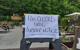 A sign was posted in the pub's garden.