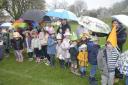 Lions Easter Egg hunt and Bonnet Competition
 Brolly good show Youngsters with the array of Bonnets brave the heavy rain.
 Photo Trevor Porter  69753 1