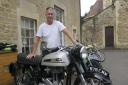 Tony Baldwin with his treasured 1960 Norton 500cc ES2 motorcycle that he has owned since he was a teenager