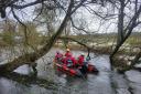 Search and rescue teams in the River Avon by Churchill Gardens