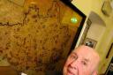 the bomb detective: John Comben in front of a copy of a map in The Keep Military Museum in Dorchester