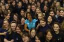 Dame Kelly Holmes with the girls at St Edmund's Girls' School. DB5115P35