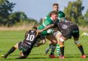 Second-row Dom Porter takes on two Marlborough defenders