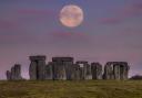 Beautiful photo shows Full Hunter's Moon setting over Stonehenge