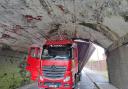 A lorry driver lodged themselves under a bridge on the A30 this morning.