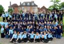 Twyford School pupils and headmaster Dr Steve Bailey celebrate the school's inspection results