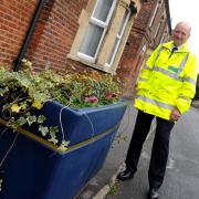 Cllr Philip Whitehead with the planters in Rotherstone, Devizes.Siobhan Boyle (SMB1296/1).