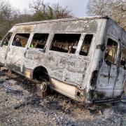 A Morgan's Vale and Woodfalls Primary School minibus was stolen, set on fire and then abandoned in a New Forest car park.