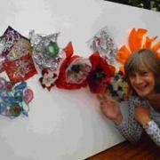 Susie Gutteridge with a piece of her upcycled art. DB8256P2