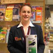 Emma Young with the Wiltshire Wildlife Trust corporate 'green tourism' award at Salisbury Tourist Information Centre.