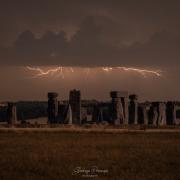 Lightning strike pictured through clouds over Stonehenge in amazing photo