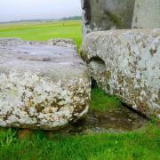 The Altar Stone, seen here underneath two bigger Sarsen stones. Credit: Professor Nick Pearce, Aberystwyth University.