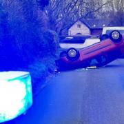Person in hospital with 'serious injuries' as car flips on roof