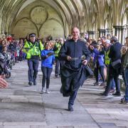 The 2024 Salisbury International Pancake Races were moved to the cloisters of Salisbury Cathedral after rain, but were deemed a success after many children participated as Shrove Tuesday fell on half term.