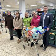 Left to right: Marie Rose from Salisbury Pantry, Gemma Phillips (Old Sarum and Longhedge Community Pantry), Kate George (Salisbury Foodbank), Karly Hart (Salisbury Radio) and Patrick Piercy (Tesco Store manager). 