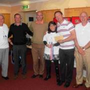 Terry Shepherd and his team are congratulated by Donna Strand and Roger Aplin (left)