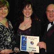 Green Business award winners Sue and Cavan Mitchell and Beth Smith (centre), of Autocrash. DB3610P11