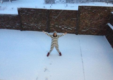 Emma Roddie enjoying the snow in her garden