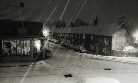 A dark and snowy Ayleswade Road in Harnham earlier this morning. By Claire Burden.