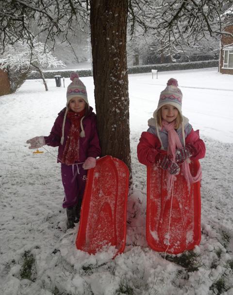 Paul Glover sent us this picture of Jade and Amber taking a rest from sledging fun.