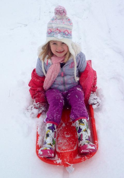 Jade Glover has been enjoying the snow on her sledge.