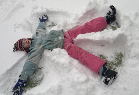 Fun making snow angels. Taken by Jeni Booth.