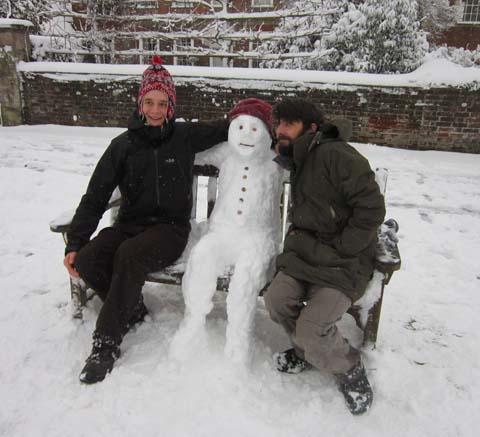 Oliver Stamp and Ben Broadley pose with Sir Schnizzle Snowalot in the Cathedral Close.