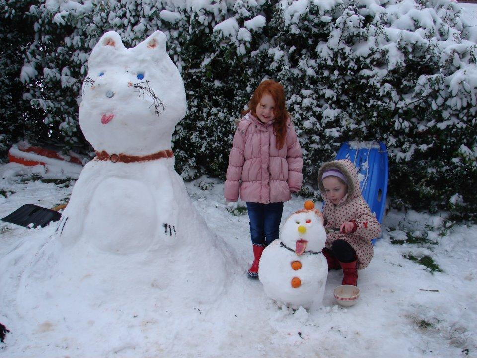 Julie Hurst sent us this picture of her daughters with their snowman and snowcat.