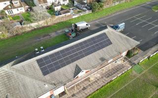 Solar panels atop the roof of the Ellingham and Ringwood Rugby Club
