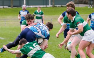 Centre Will Murley and fullback Rob Crossley combine to stop the Newbury centre in his tracks