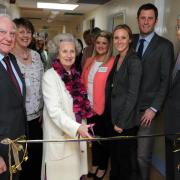 Luke March (far right) with Sir Christopher and Lady Jo Benson at the opening of the Benson Suite at Salisbury District Hospital in 2013