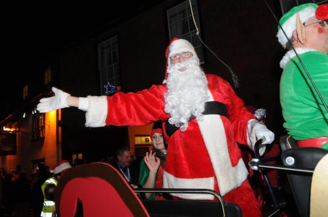 Father Christmas arrives. Fordingbridge Christmas lights switch-on. Picture by Tom Gregory.