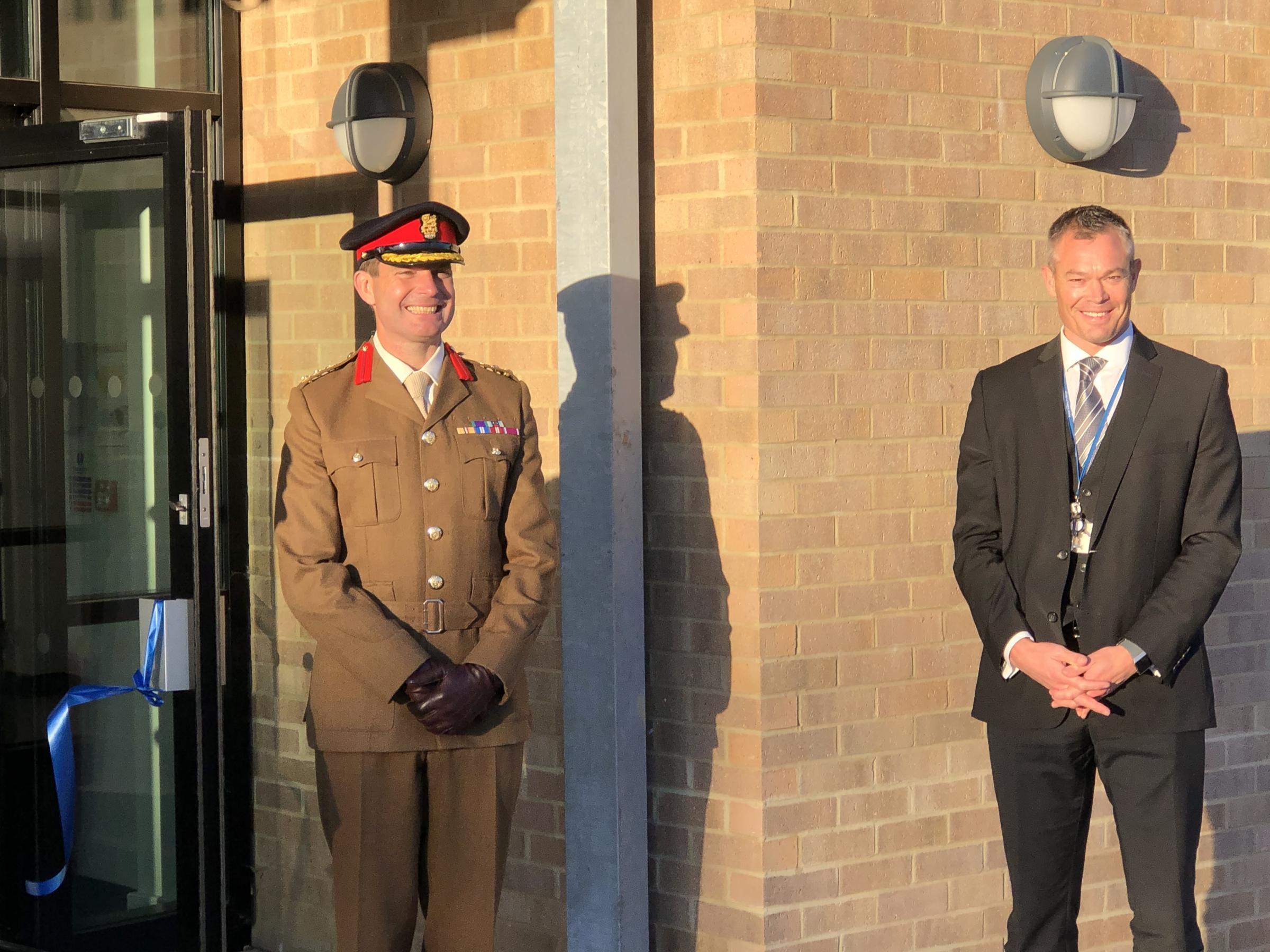 Brigadier Paddy Ginn, Commander of 20 Armoured Infantry Brigade and Mr Sam Johnston, Executive Principal for Salisbury Plain Academies outside the new classroom block at Avon Valley College in Durrington 