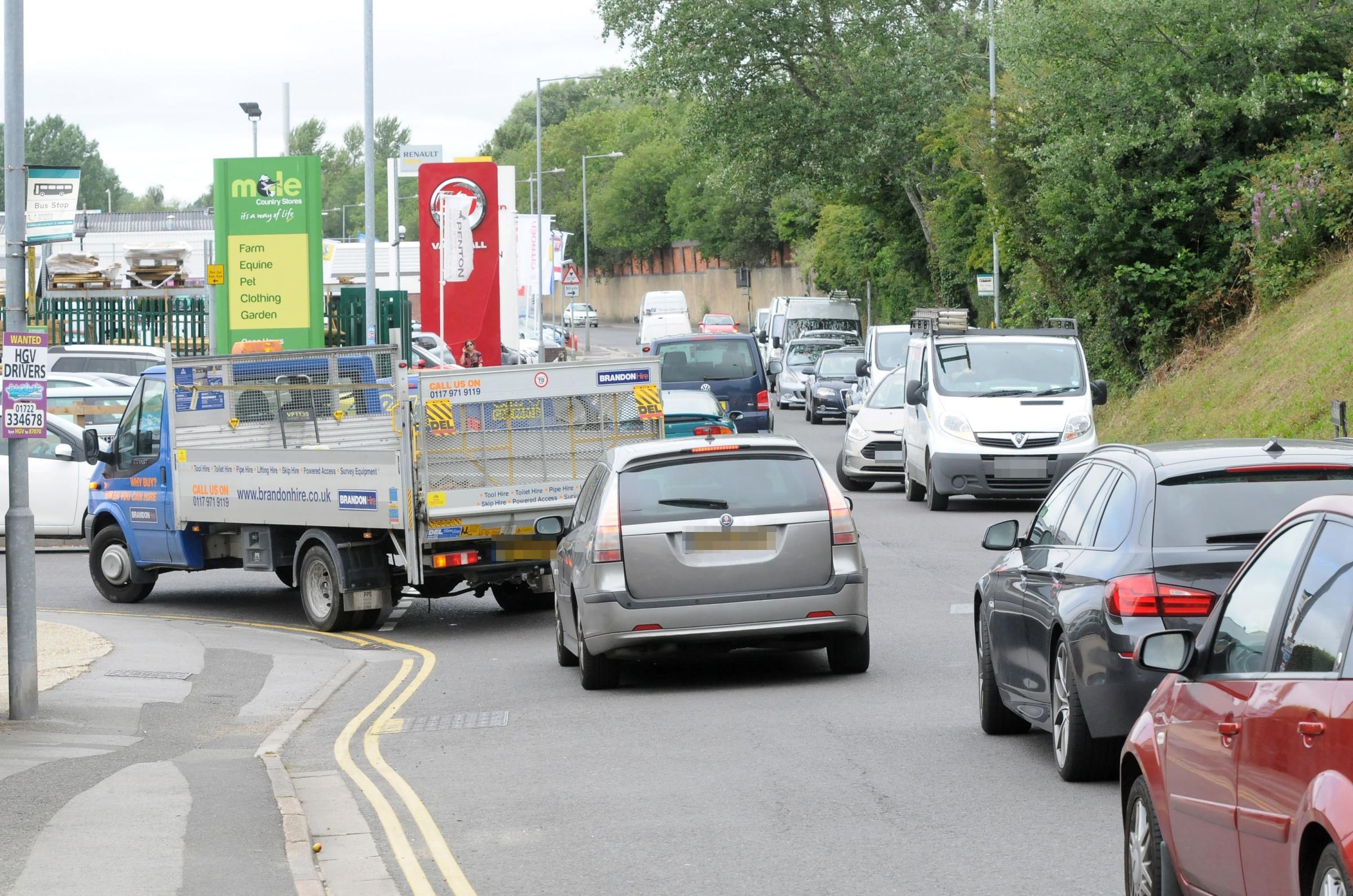 Traffic queuing for the Household Recycling Centre on Churchfields Industrial Estate, Salisbury...Traffic queuing to the junction of Stephenson road and Churchfields road. DC6585P6..Picture by Tom Gregory.