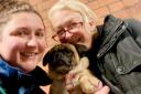 Wiltshire dog warden Alex, Pugsie and Pugsie's owner reunited after the little dog ran off and got on a train by itself