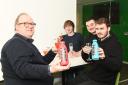 Swindon Advertiser reporters Aled Thomas, Daniel Angelini, Edward Burnett, and Jason Hughes with bottles and glasses of Prime.