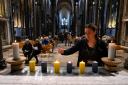 Candles in the colours of the Ukrainian flag were place on the Trinity Chapel Altar during Prayers for Ukraine at Salisbury Cathedral