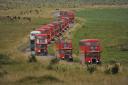 Red buses on the way to Imber