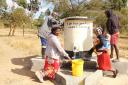 Whites in Salisbury funded a water pump in the province of Manicaland in Zimbabwe through purchasing their office drinking water from AquAid.