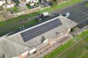 Solar panels atop the roof of the Ellingham and Ringwood Rugby Club