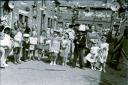 Children in fancy dress at a Coronation Day street party in Granville Place, Wharf Hill, in June 1953