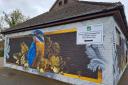 A Wiltshire Council sign has been installed on Tech Moon's kingfisher mural in the Central Car Park.