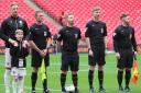 James Durkin, centre, refereed the National League play-off final at Wembley