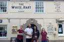CJ and his partner, Anne Marie (centre) with new staff at The White Hart